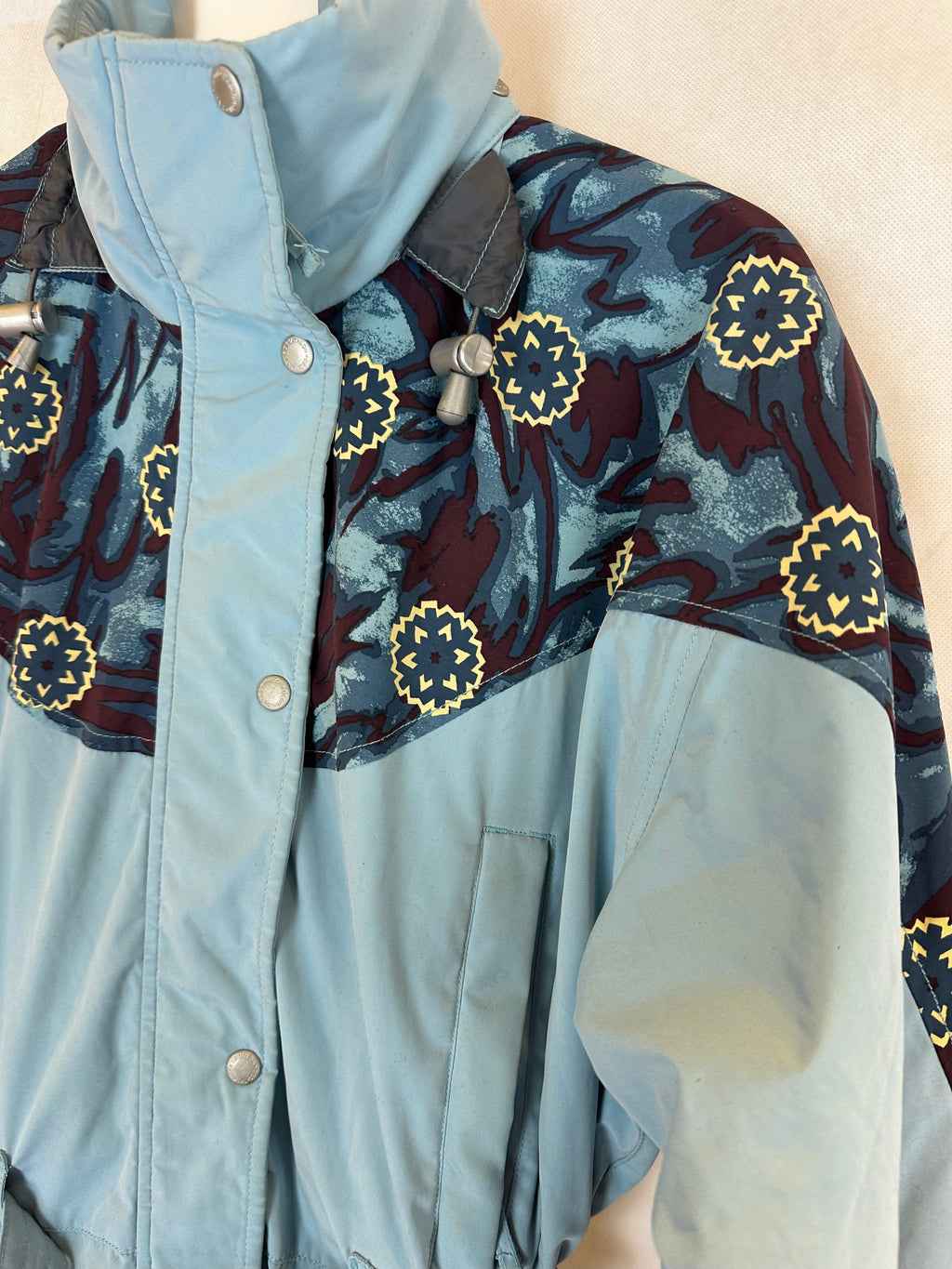 Vintage Skioverall in turkis mit Muster S/M