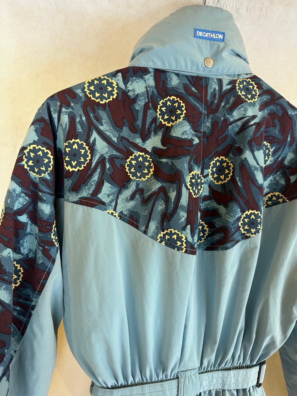 Vintage Skioverall in turkis mit Muster S/M