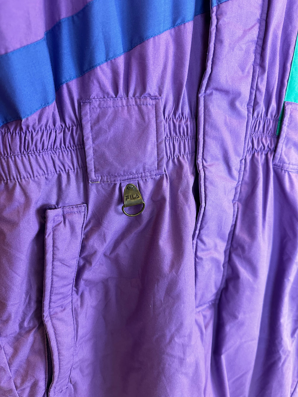 Vintage Skioverall von FILA in Lila/grün in L/XL size 52