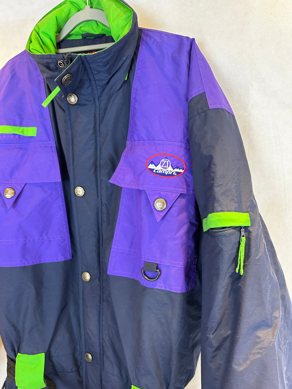 Vintage Skioverall von CAMPRI in schwarz/Lila in L/XL