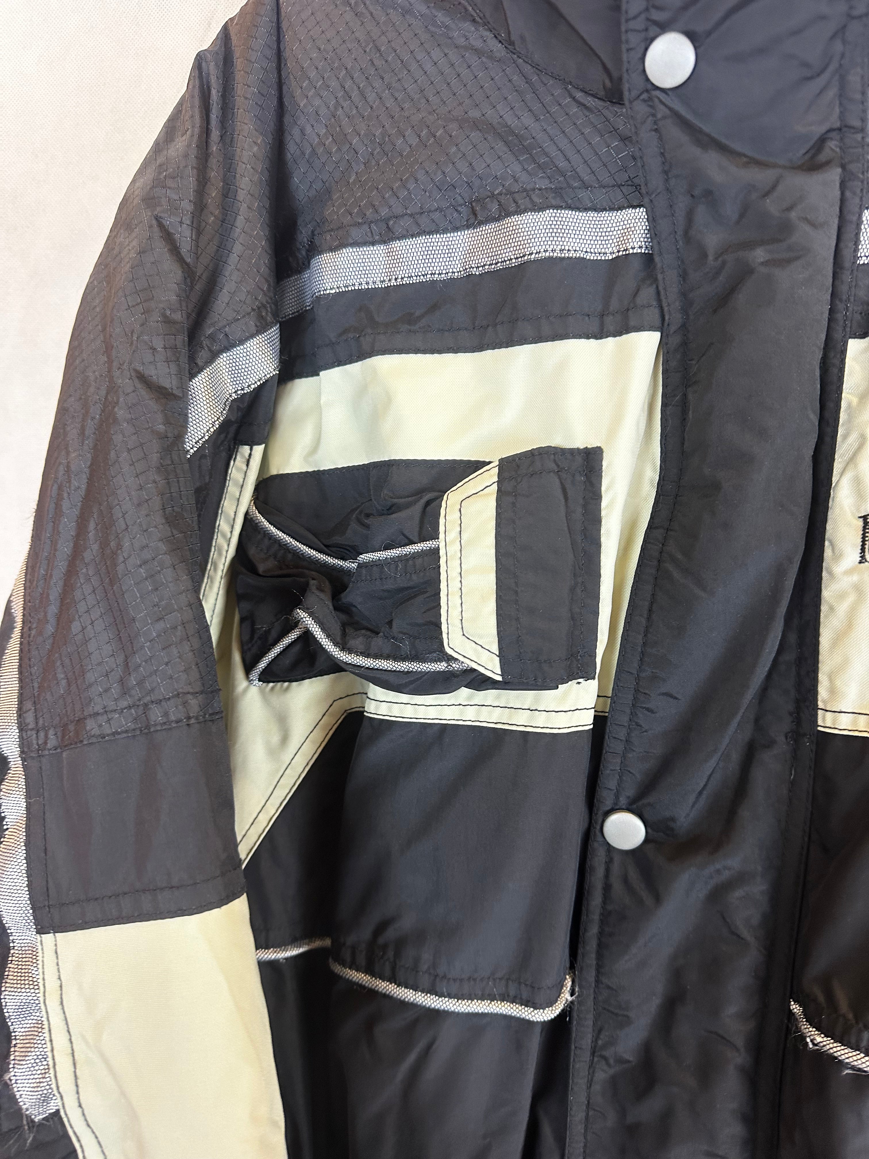 Vintage Skioverall  in Schwarz/weiss in M size 54