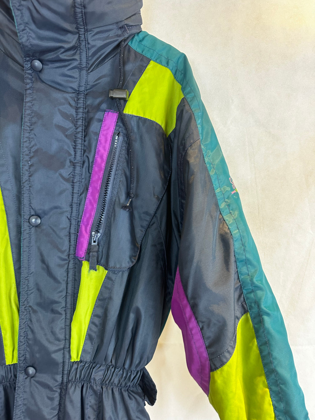 Vintage Skioverall in schwarz/bunt in S/M