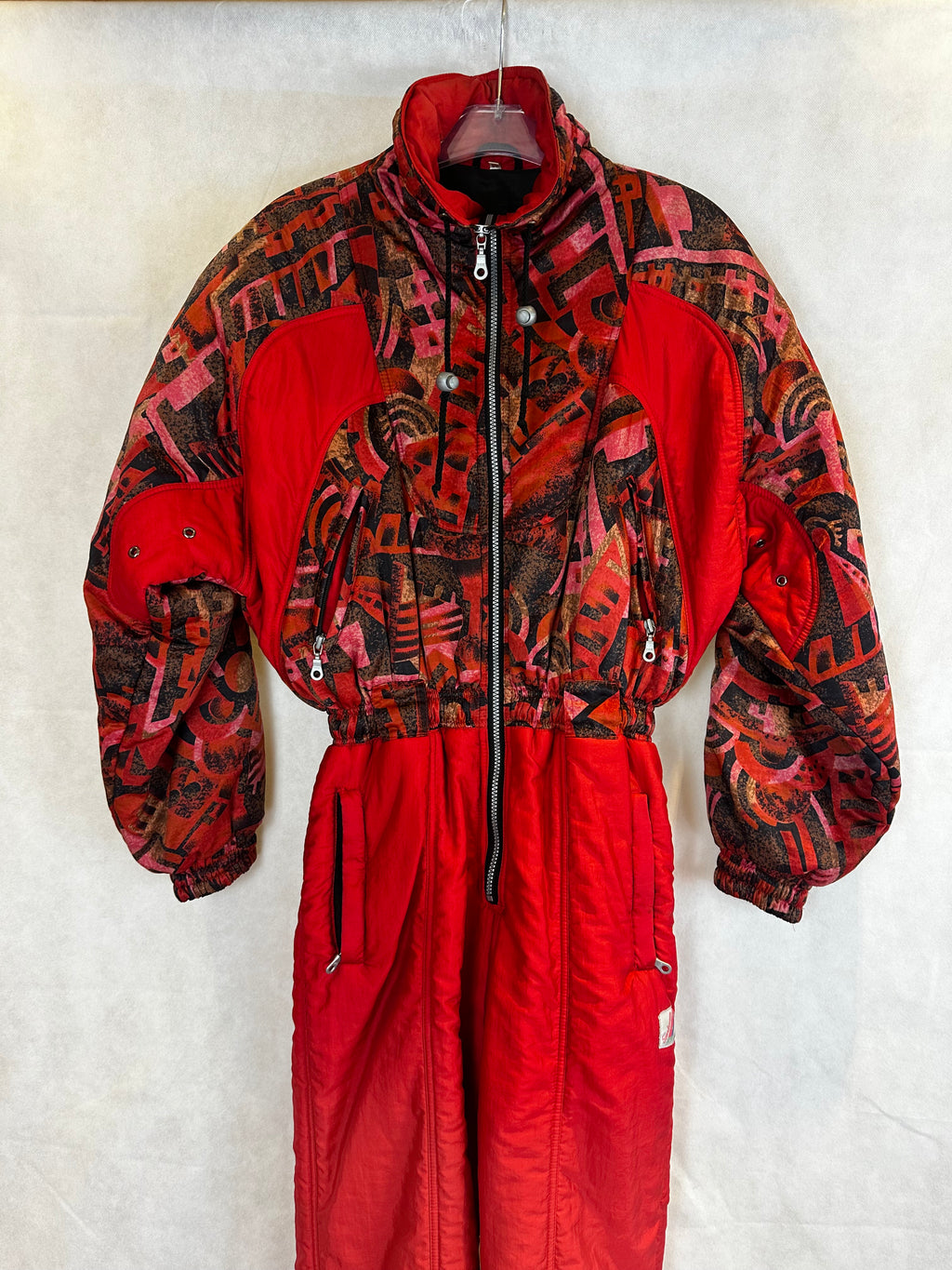 Vintage Skioverall in rot mit muster in M/S