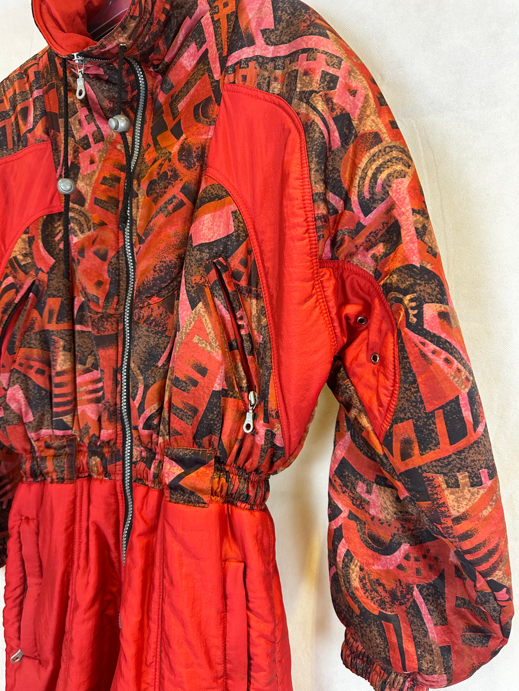 Vintage Skioverall in rot mit muster in M/S