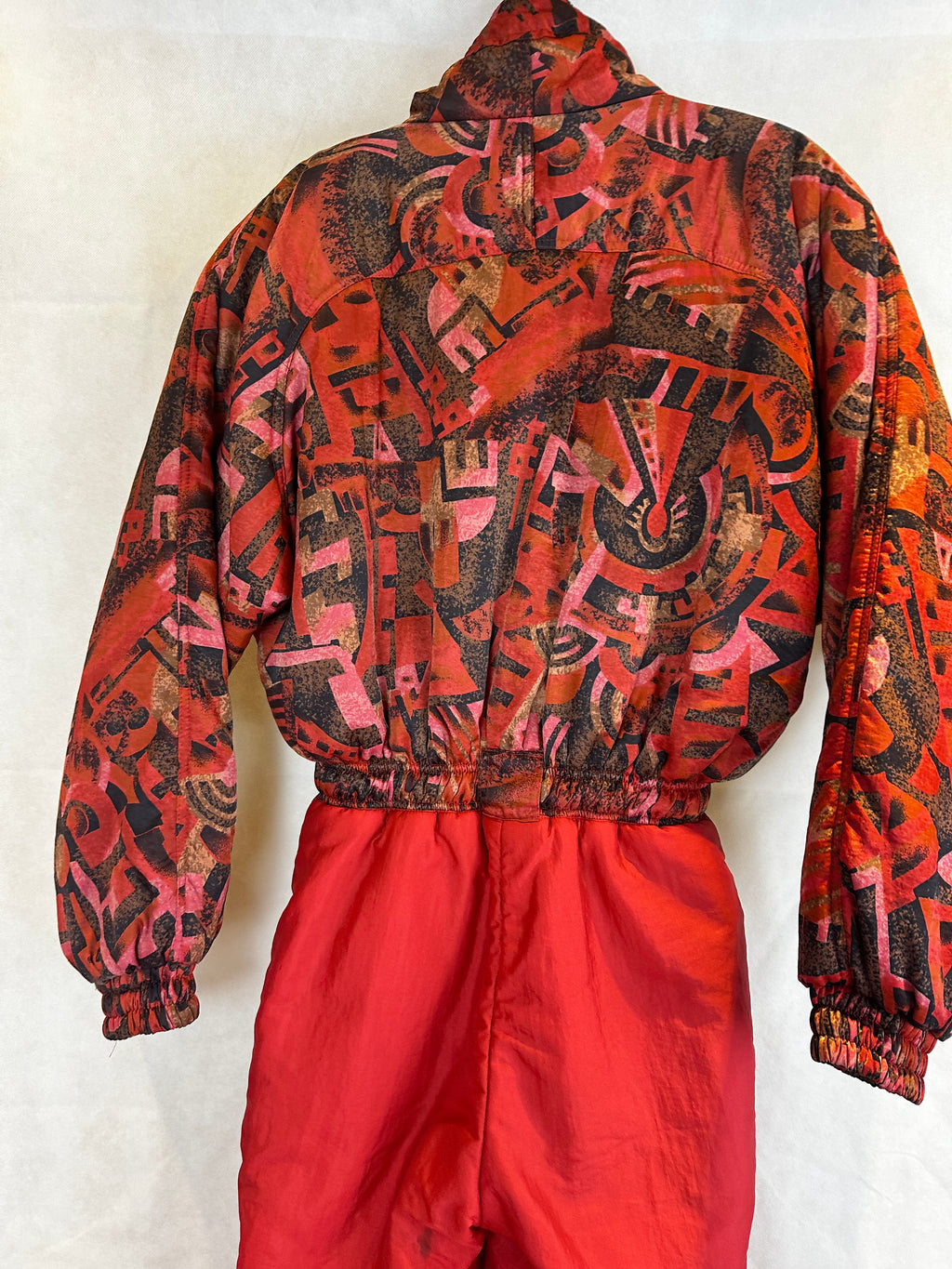 Vintage Skioverall in rot mit muster in M/S