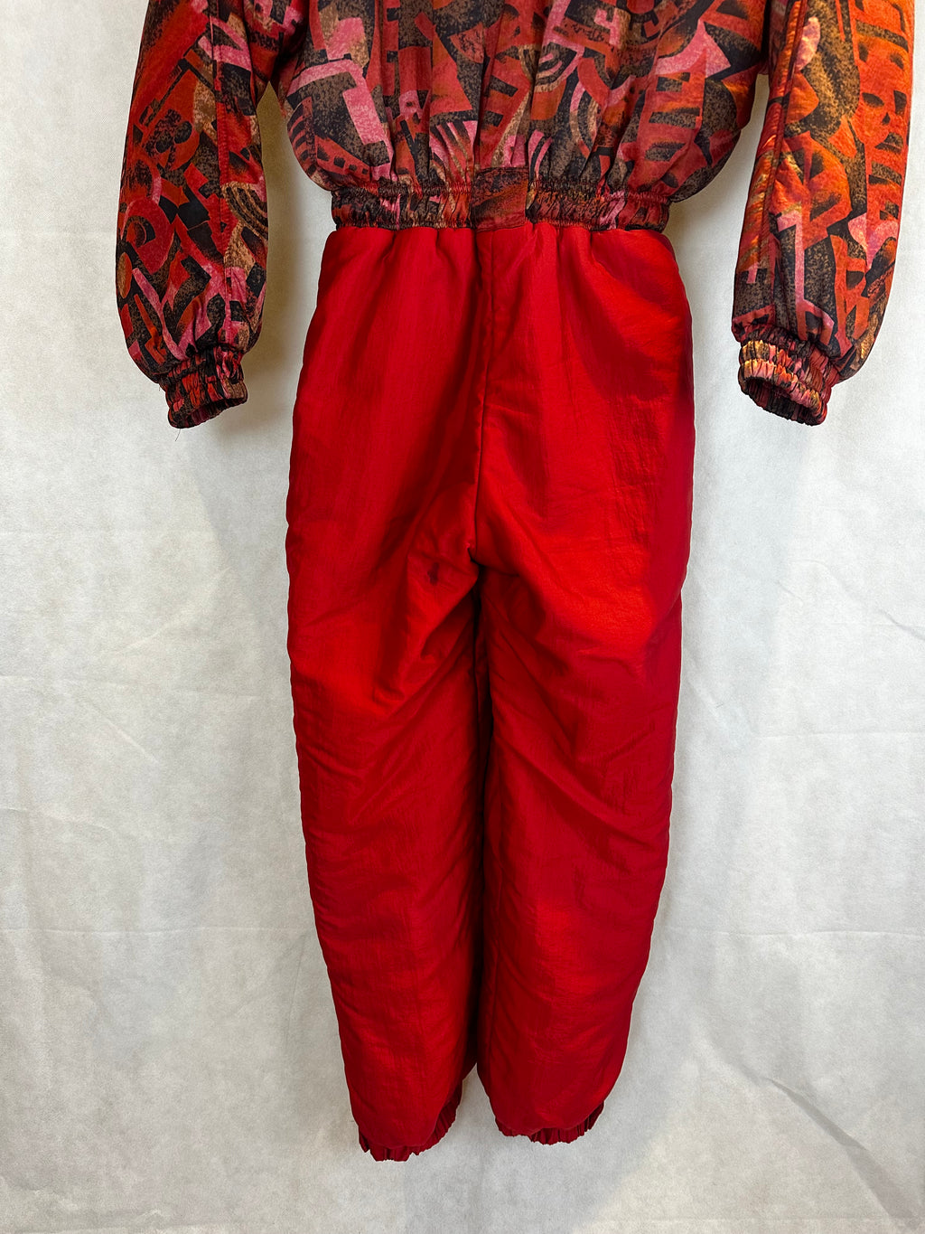 Vintage Skioverall in rot mit muster in M/S