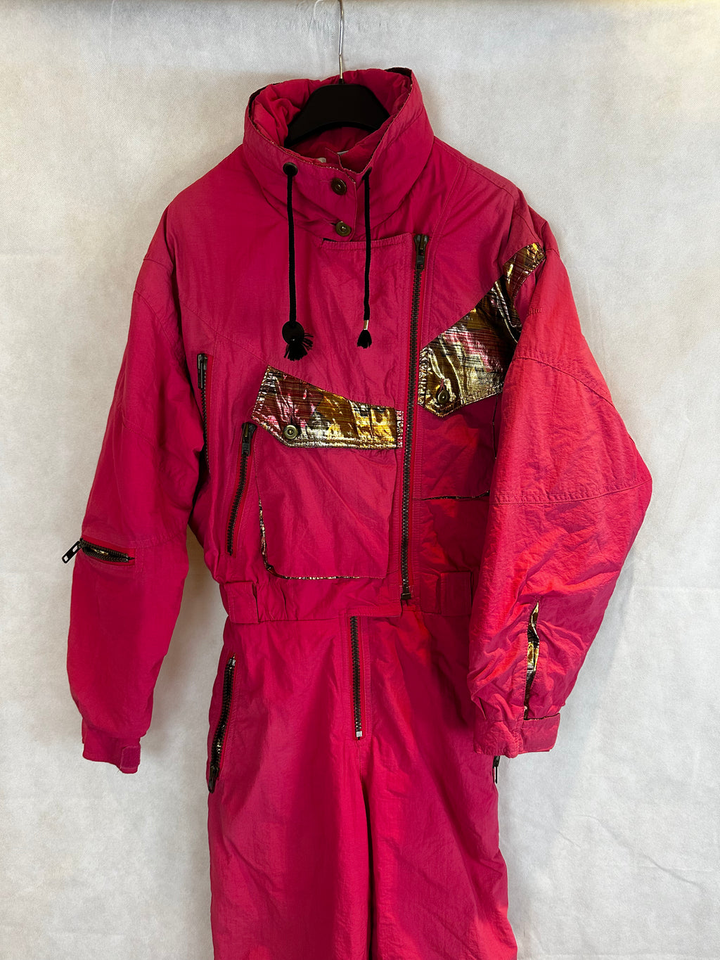 Vintage Skioverall von Sergio tachi in rosa/gold S/M