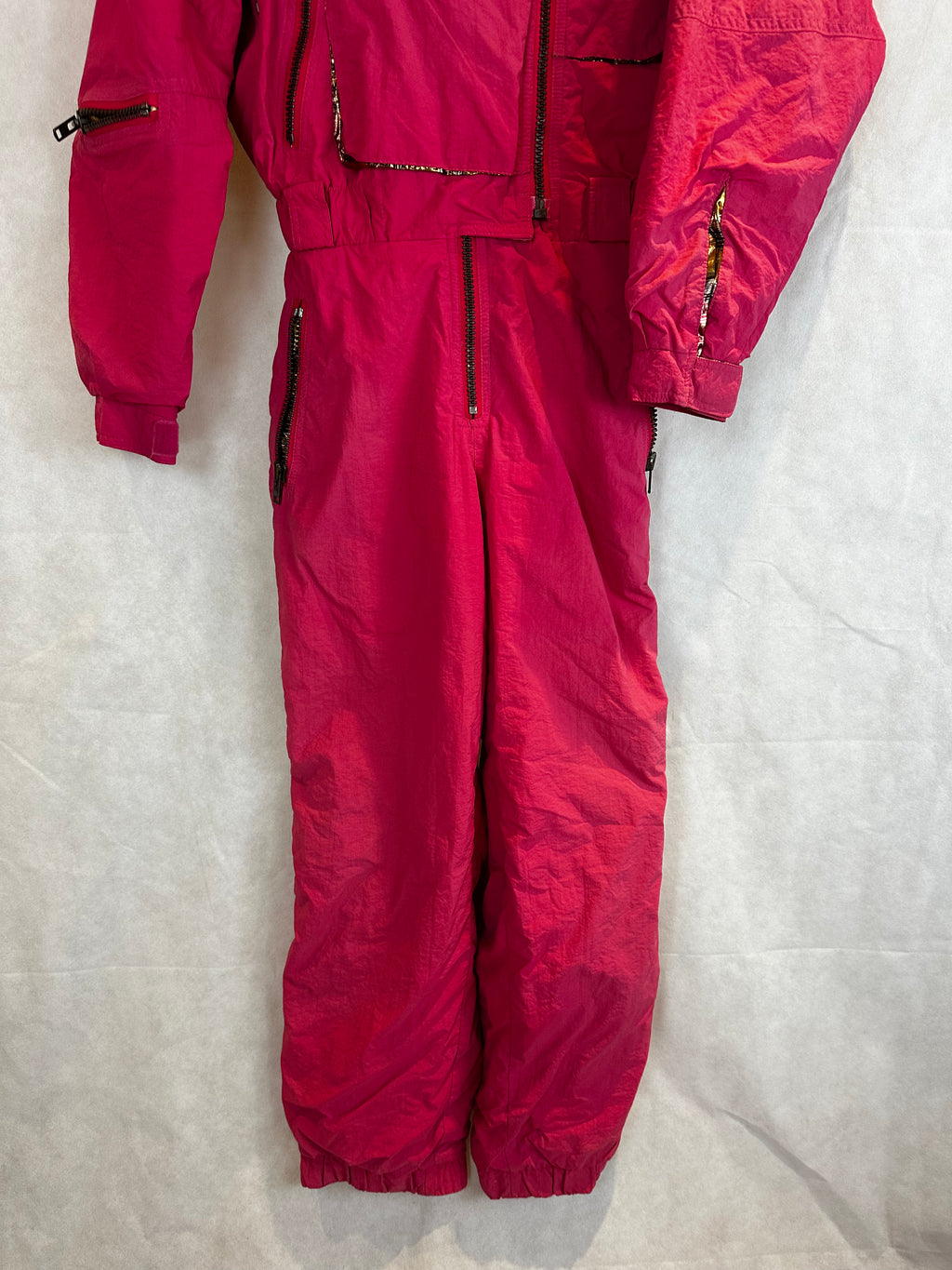 Vintage Skioverall von Sergio tachi in rosa/gold S/M