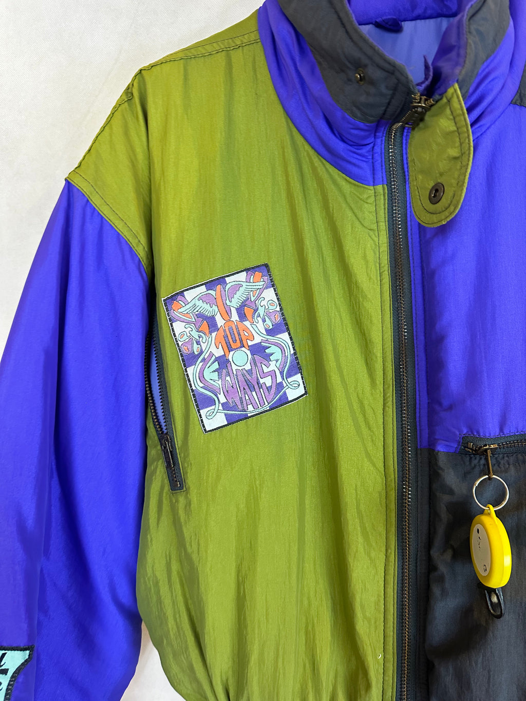 Vintage Skioverall in lila/grün i S/M