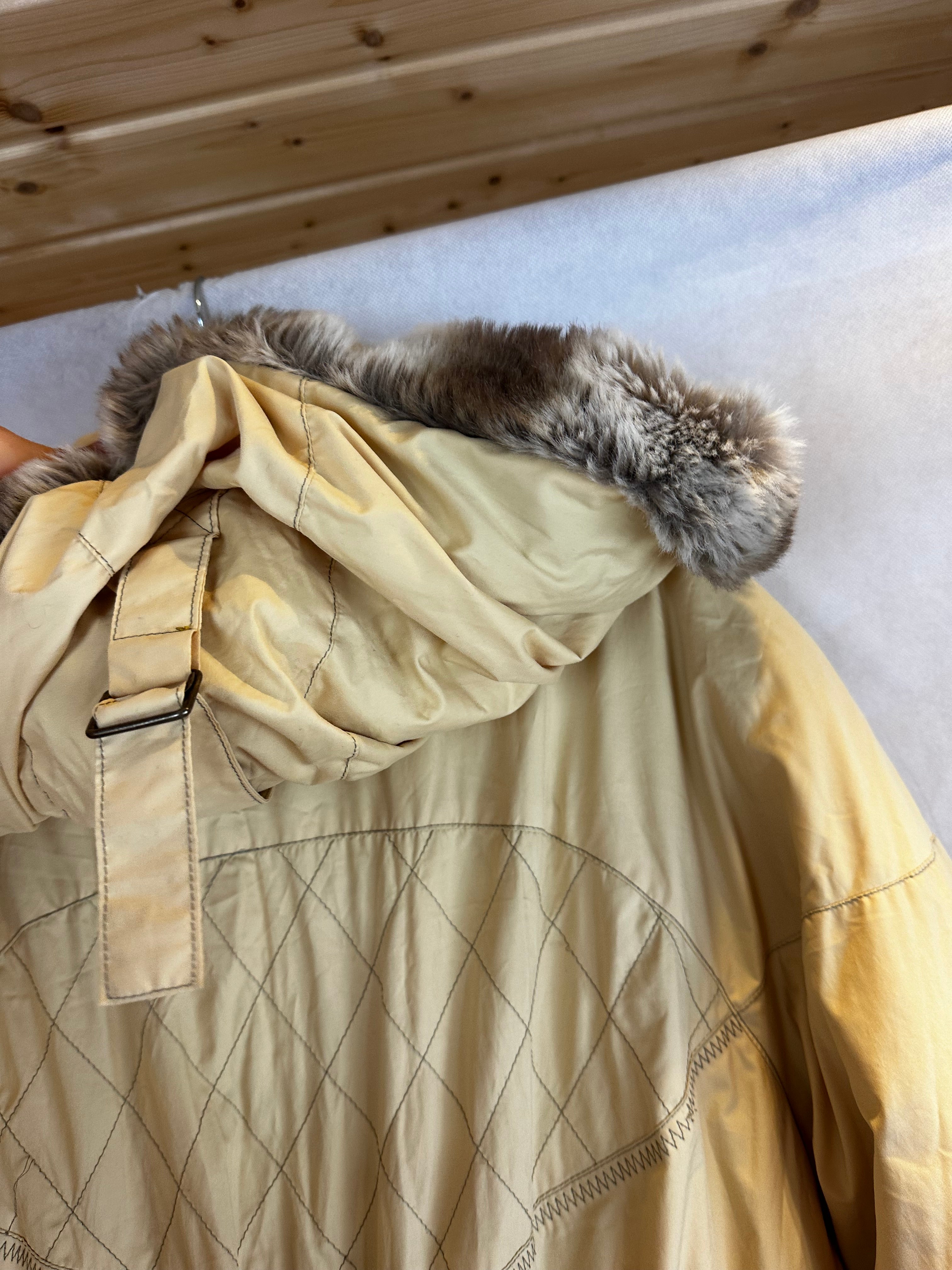 Vintage Skioverall in gelb mit Kaputze in S/M