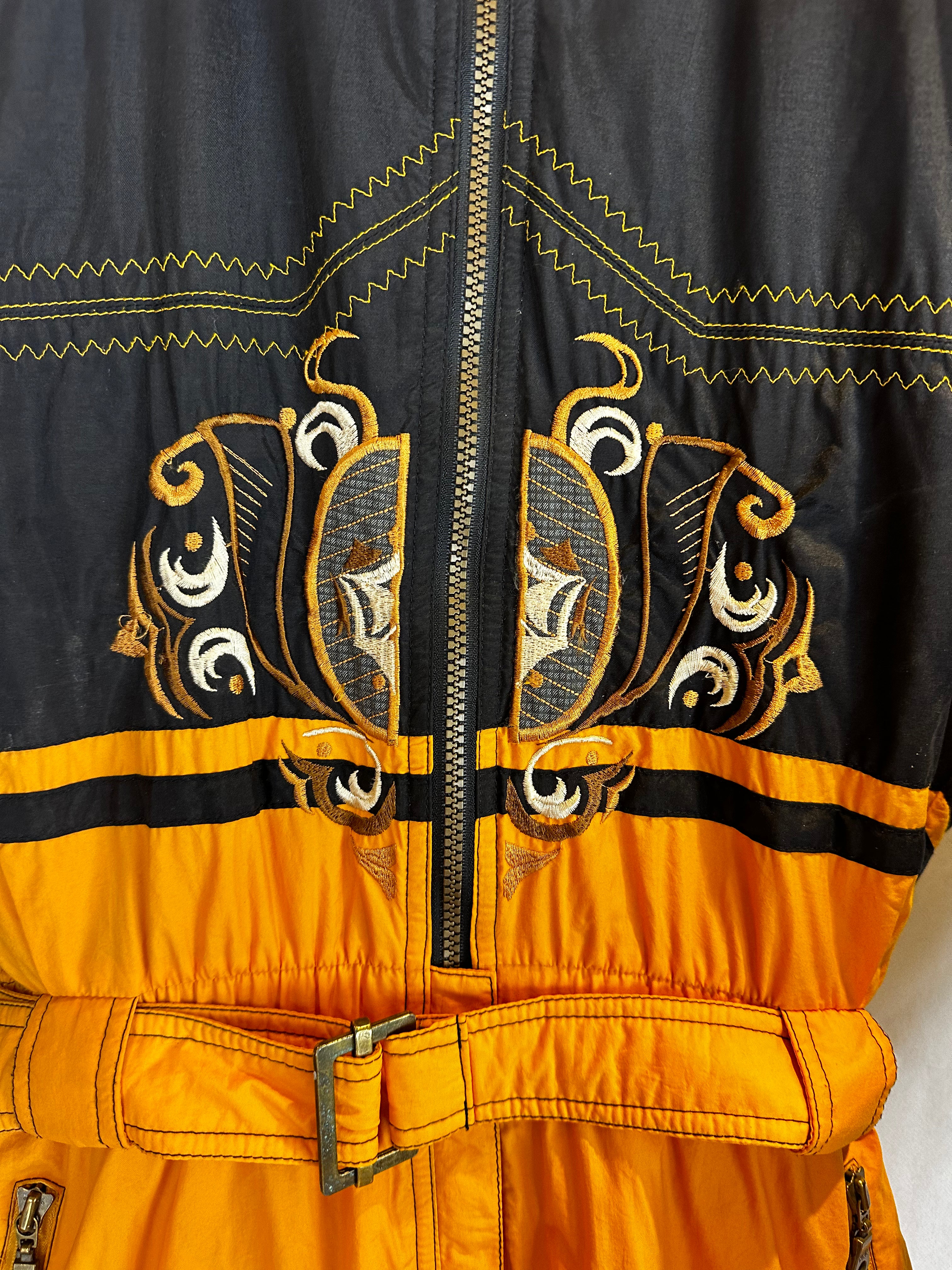 Vintage Skioverall von Diadora in gelb/schwarz in M