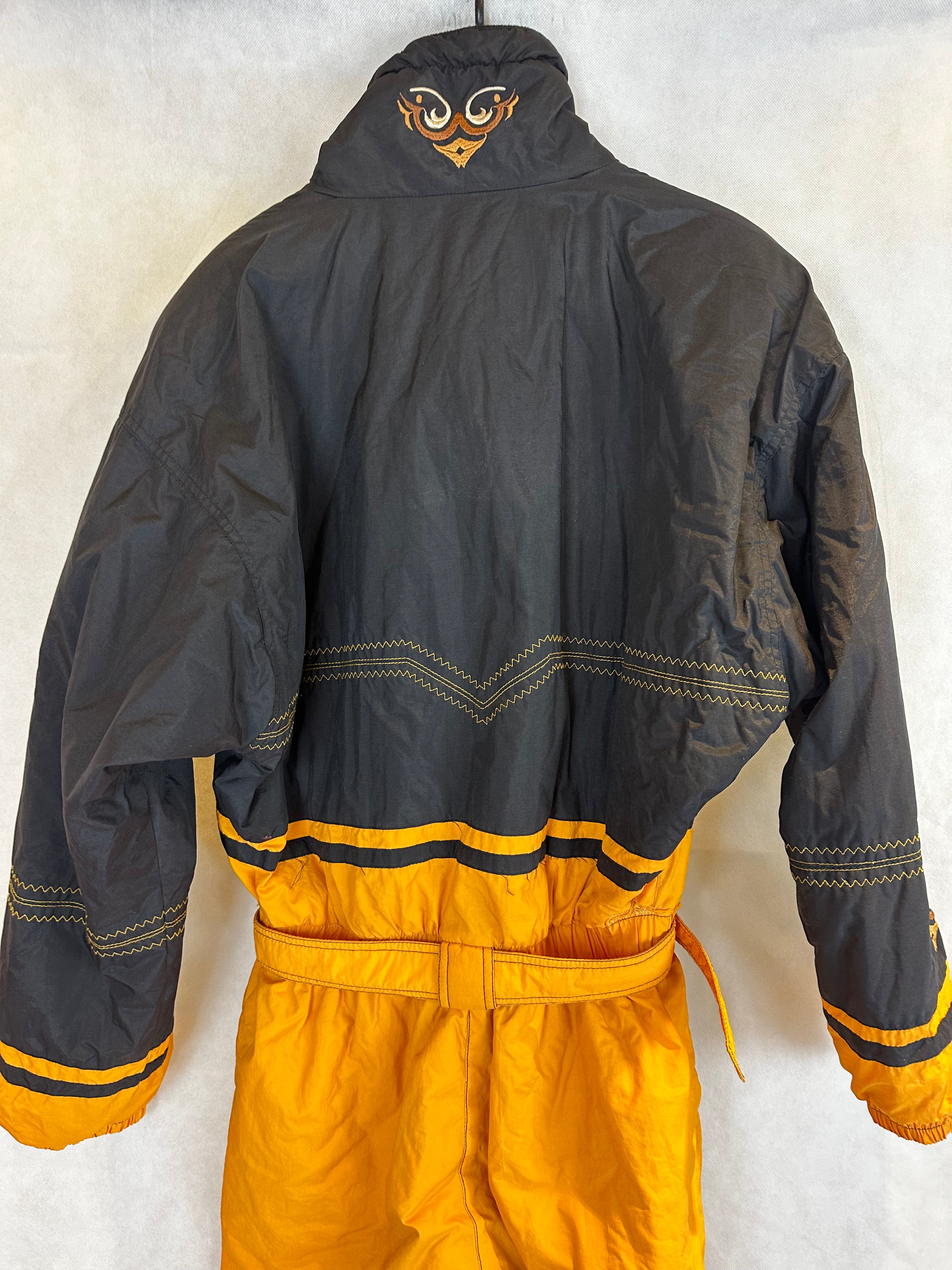 Vintage Skioverall von Diadora in gelb/schwarz in M