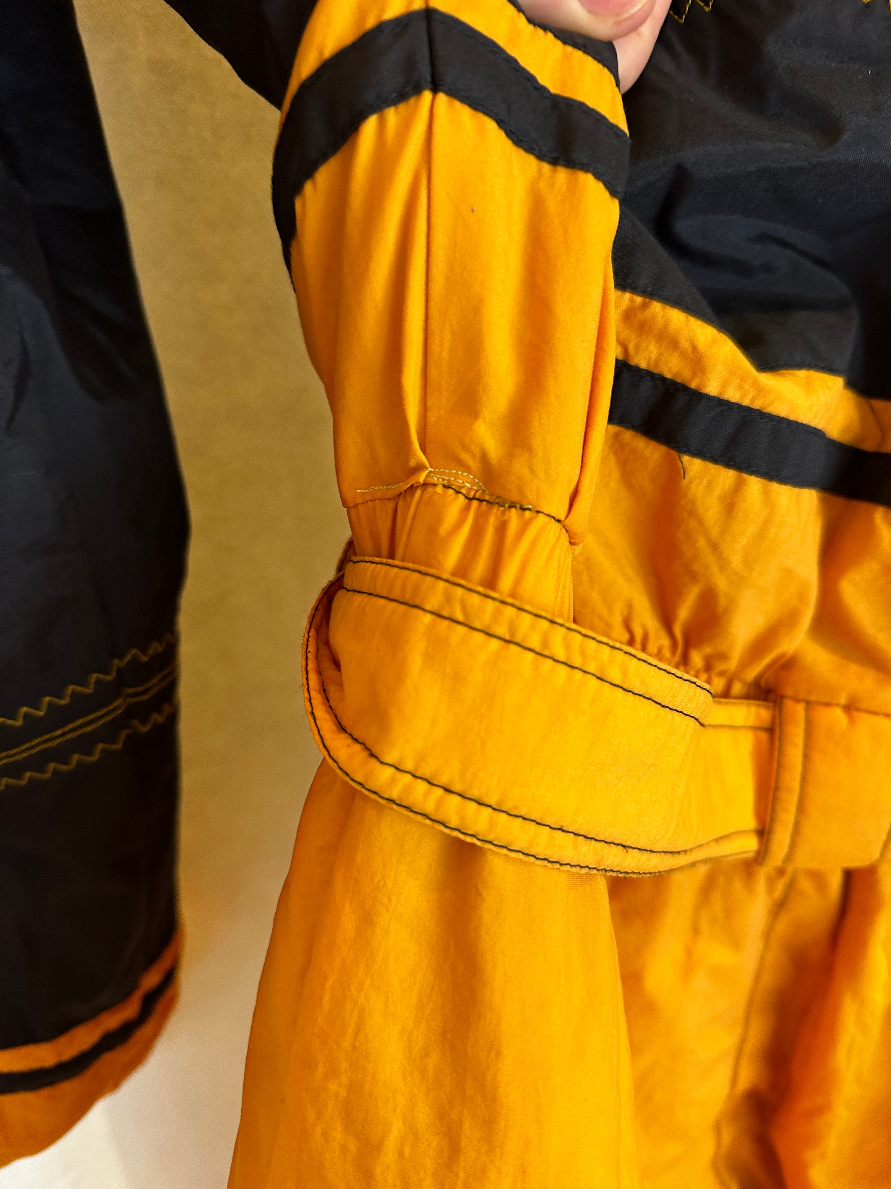 Vintage Skioverall von Diadora in gelb/schwarz in M