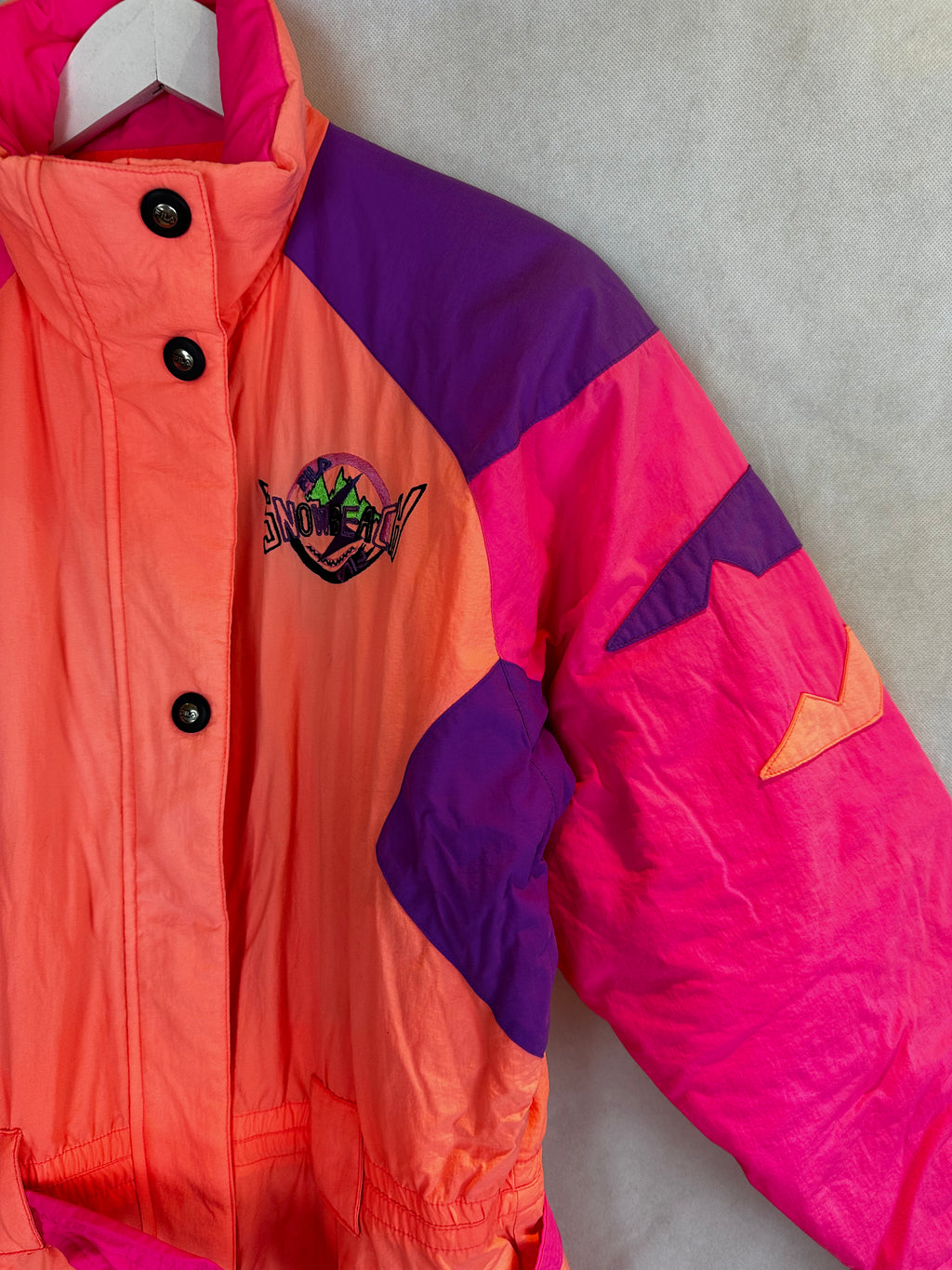 Vintage Skioverall von FILA in rosa/orange in S/M