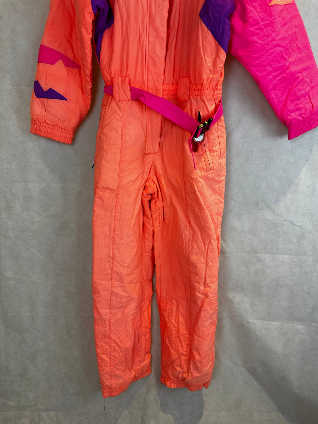 Vintage Skioverall von FILA in rosa/orange in S/M