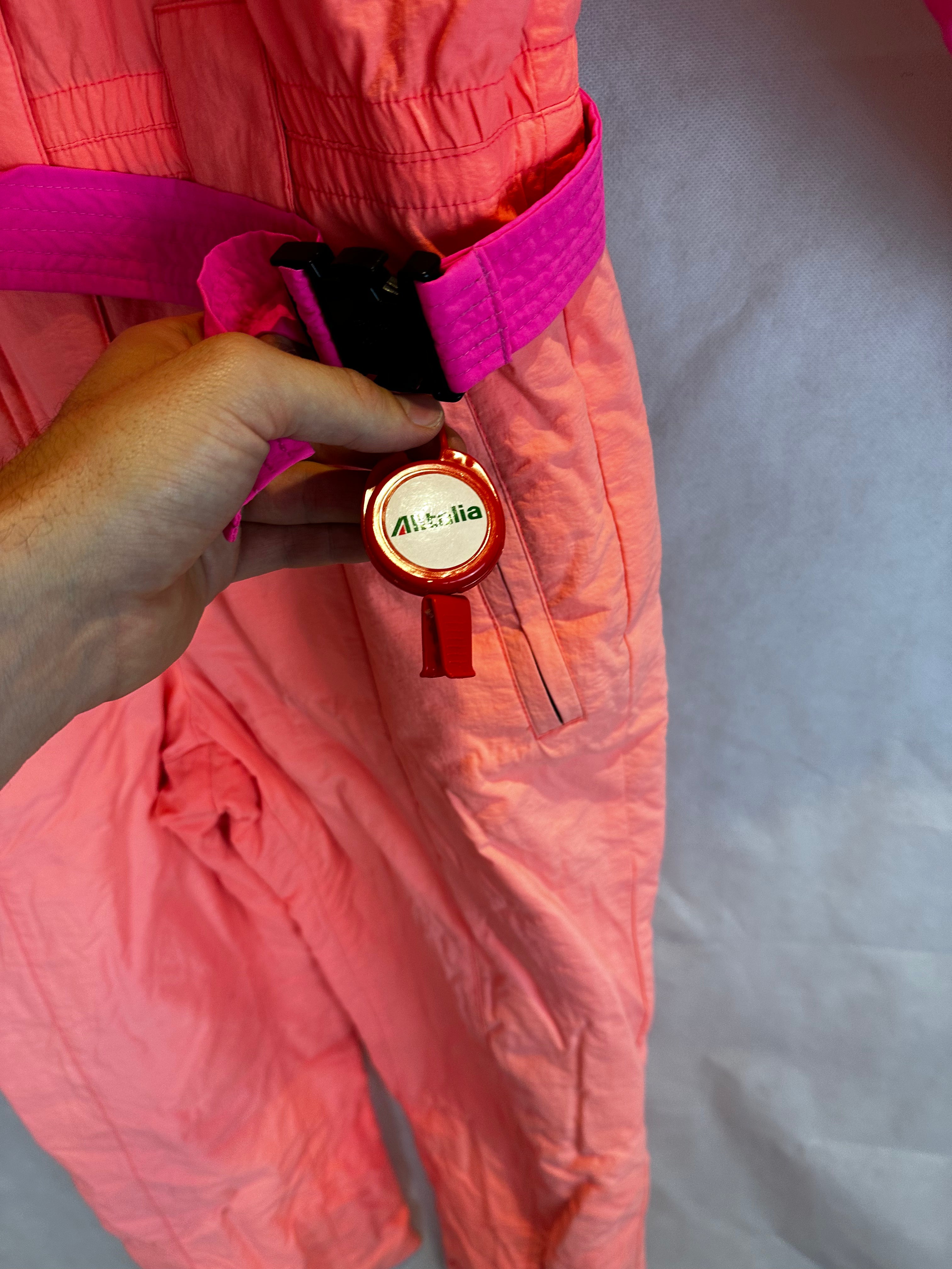 Vintage Skioverall von FILA in rosa/orange in S/M