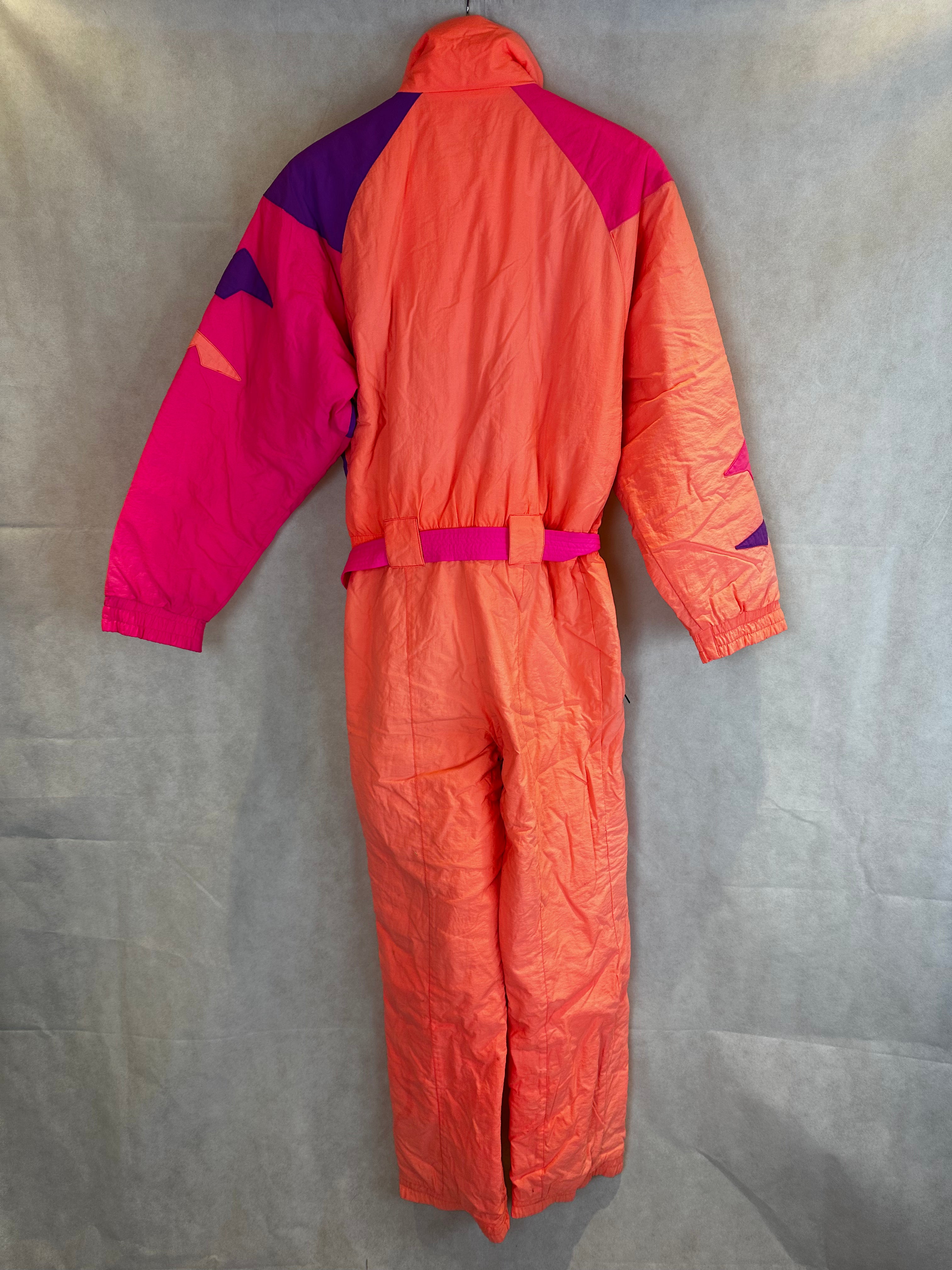 Vintage Skioverall von FILA in rosa/orange in S/M