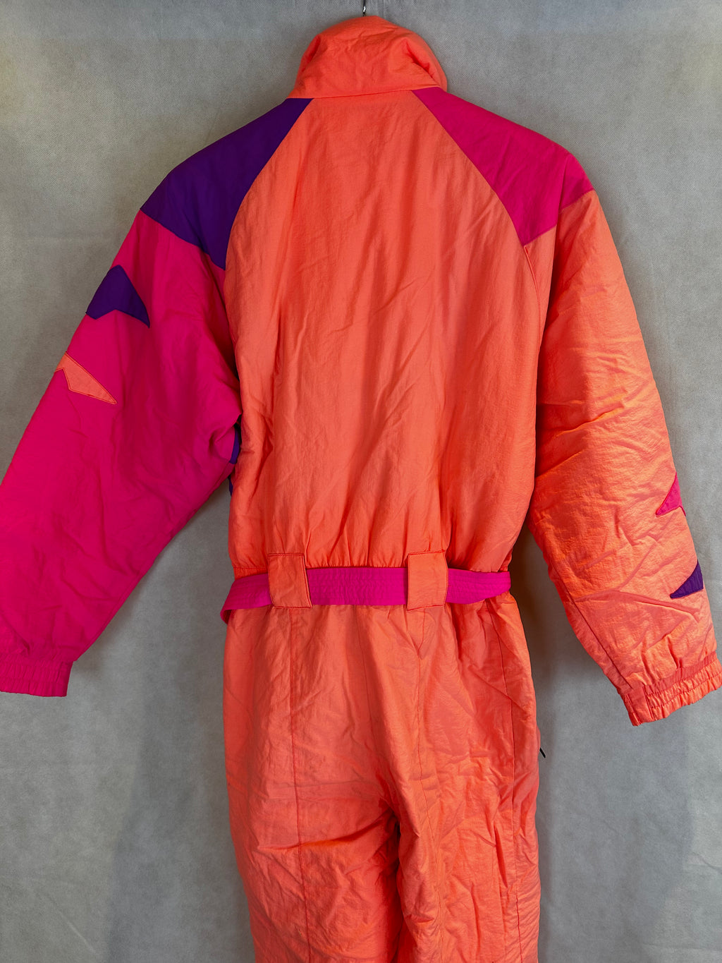 Vintage Skioverall von FILA in rosa/orange in S/M