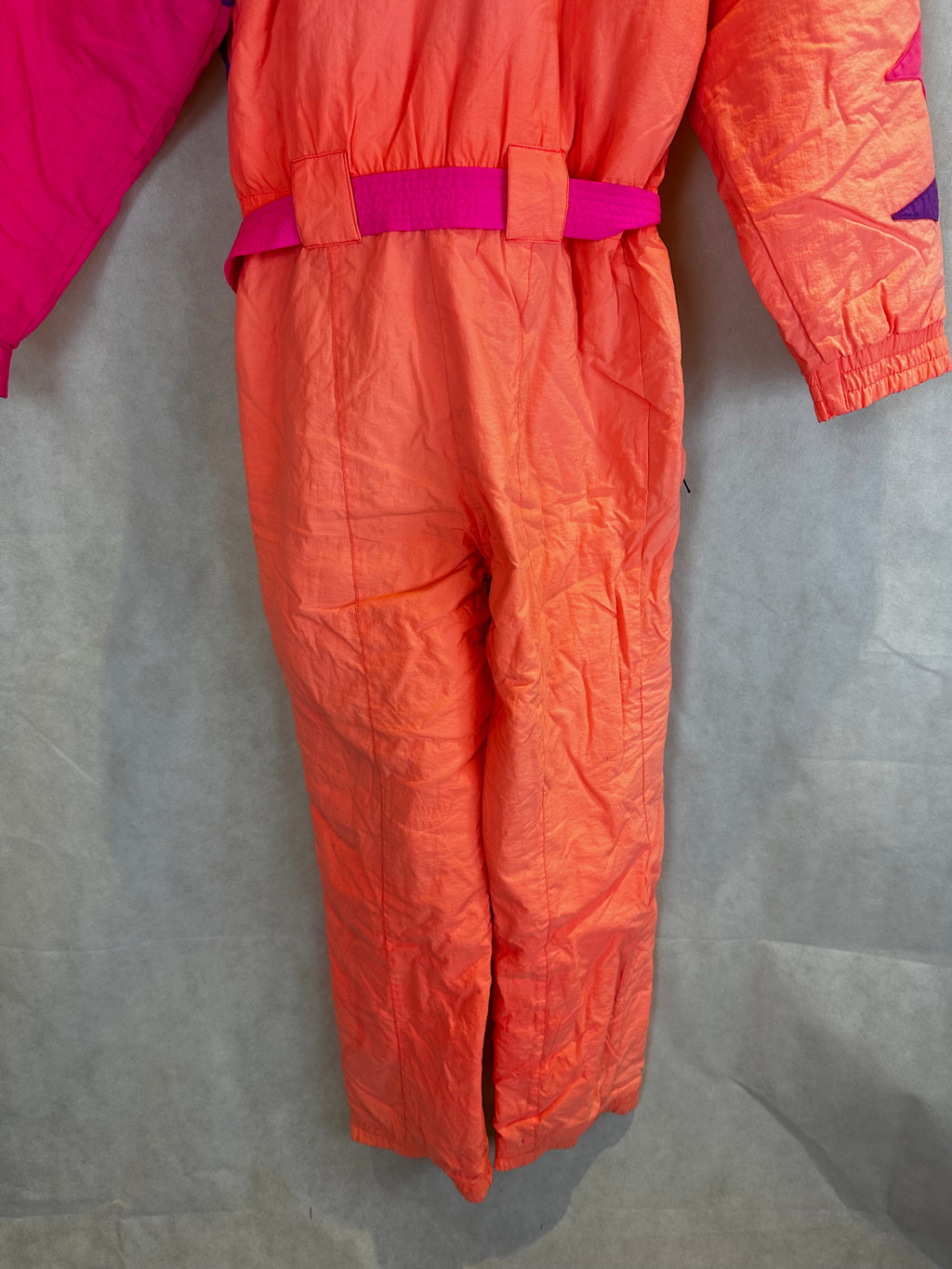 Vintage Skioverall von FILA in rosa/orange in S/M