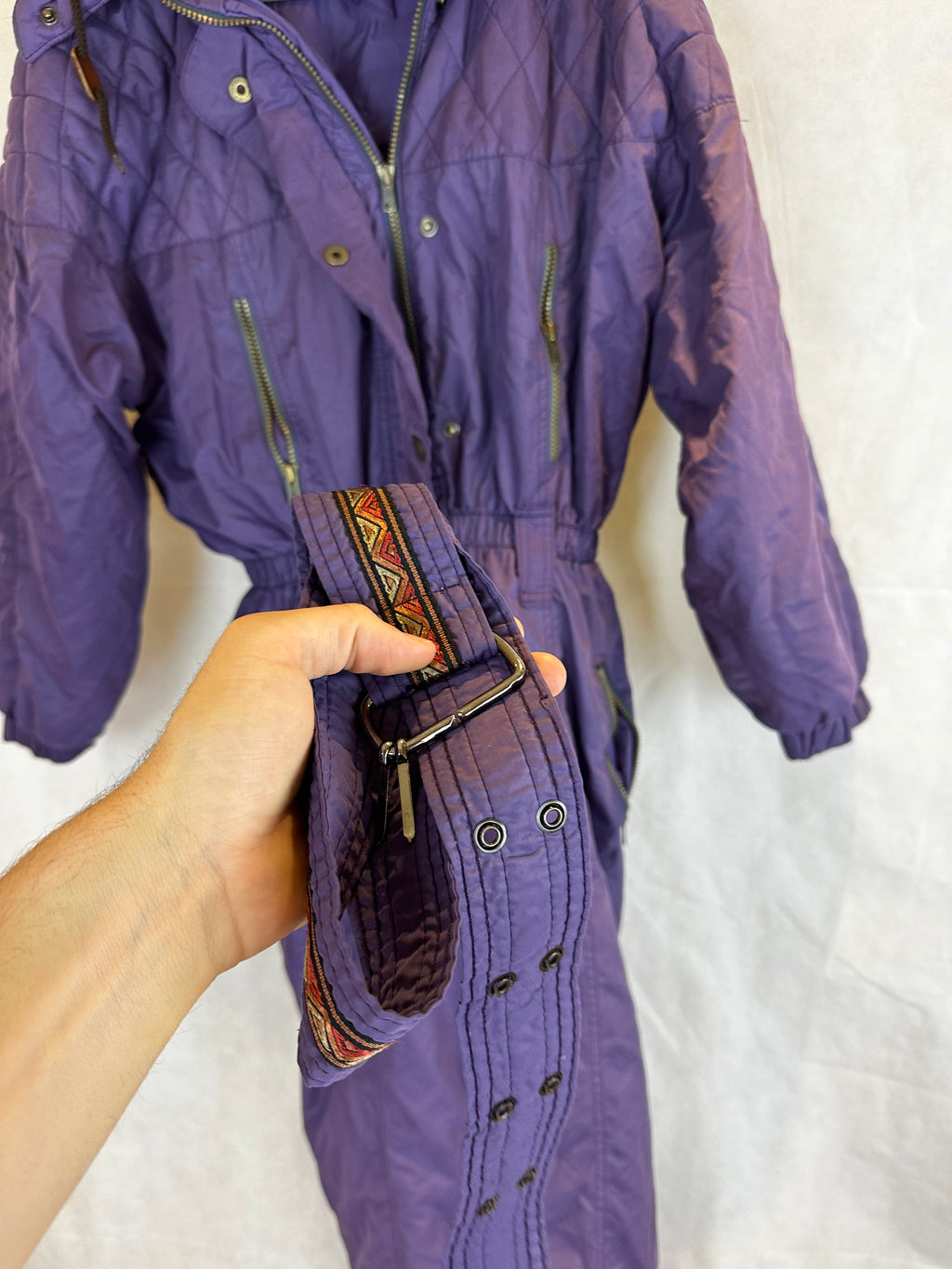 Vintage Skioverall  in lila mit fell an der kaputze