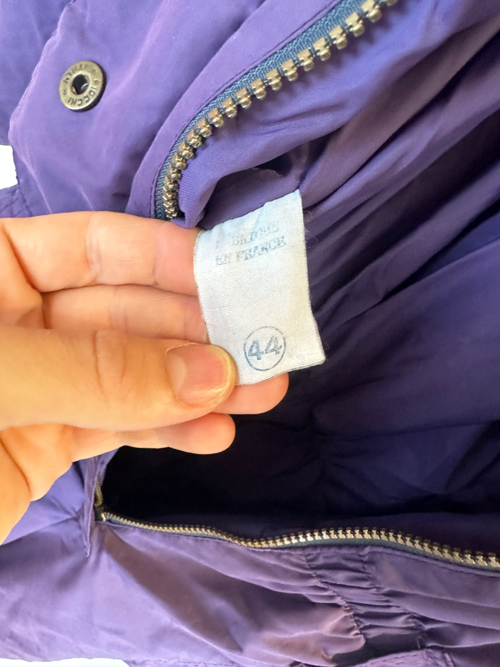 Vintage Skioverall  in lila mit fell an der kaputze