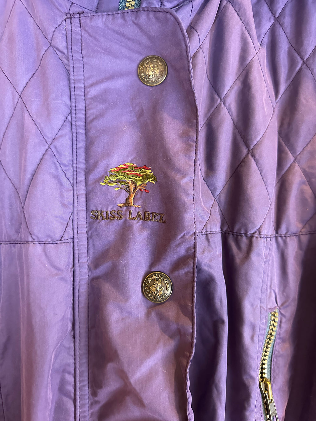 Vintage Skioverall  in lila mit fell an der kaputze