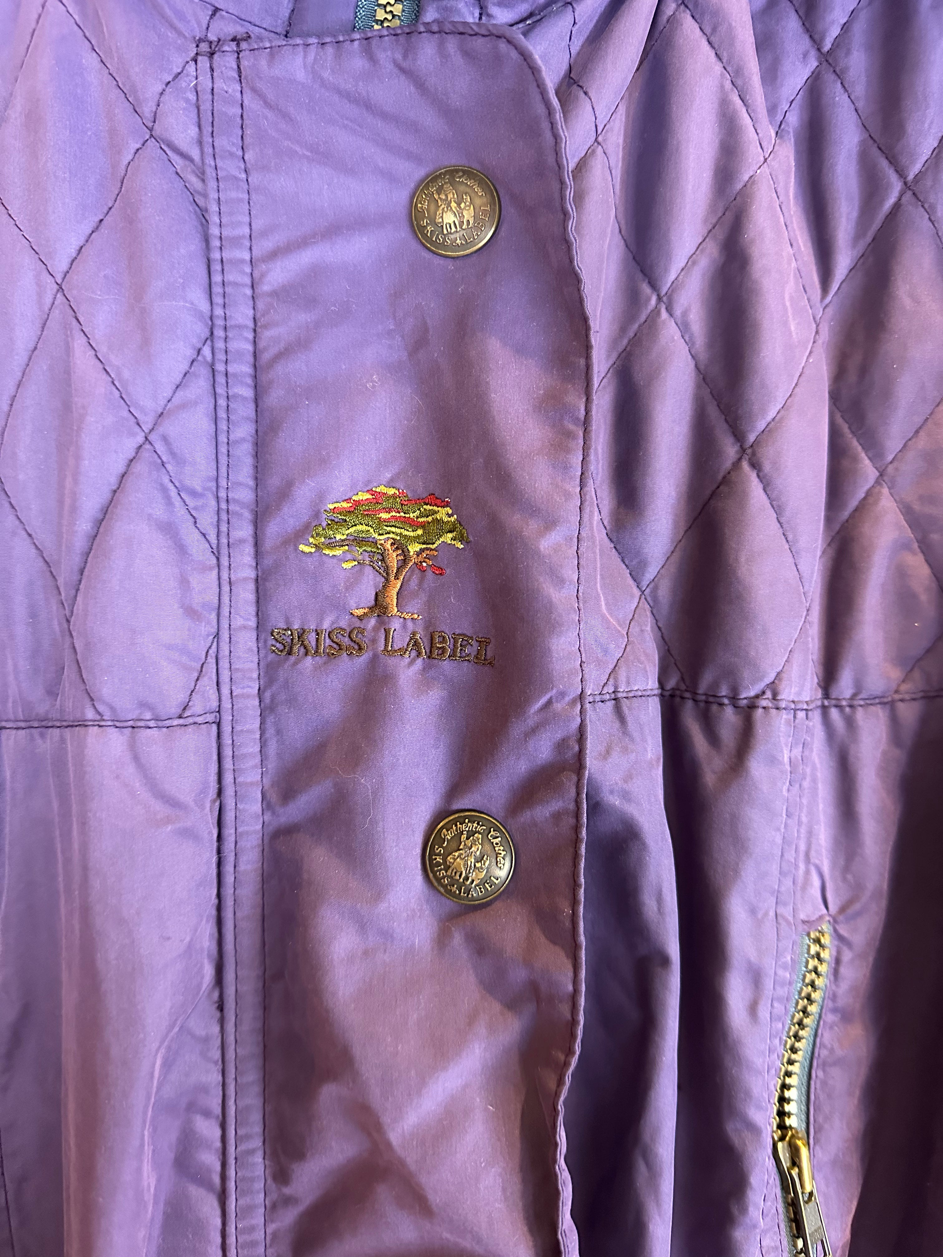 Vintage Skioverall  in lila mit fell an der kaputze