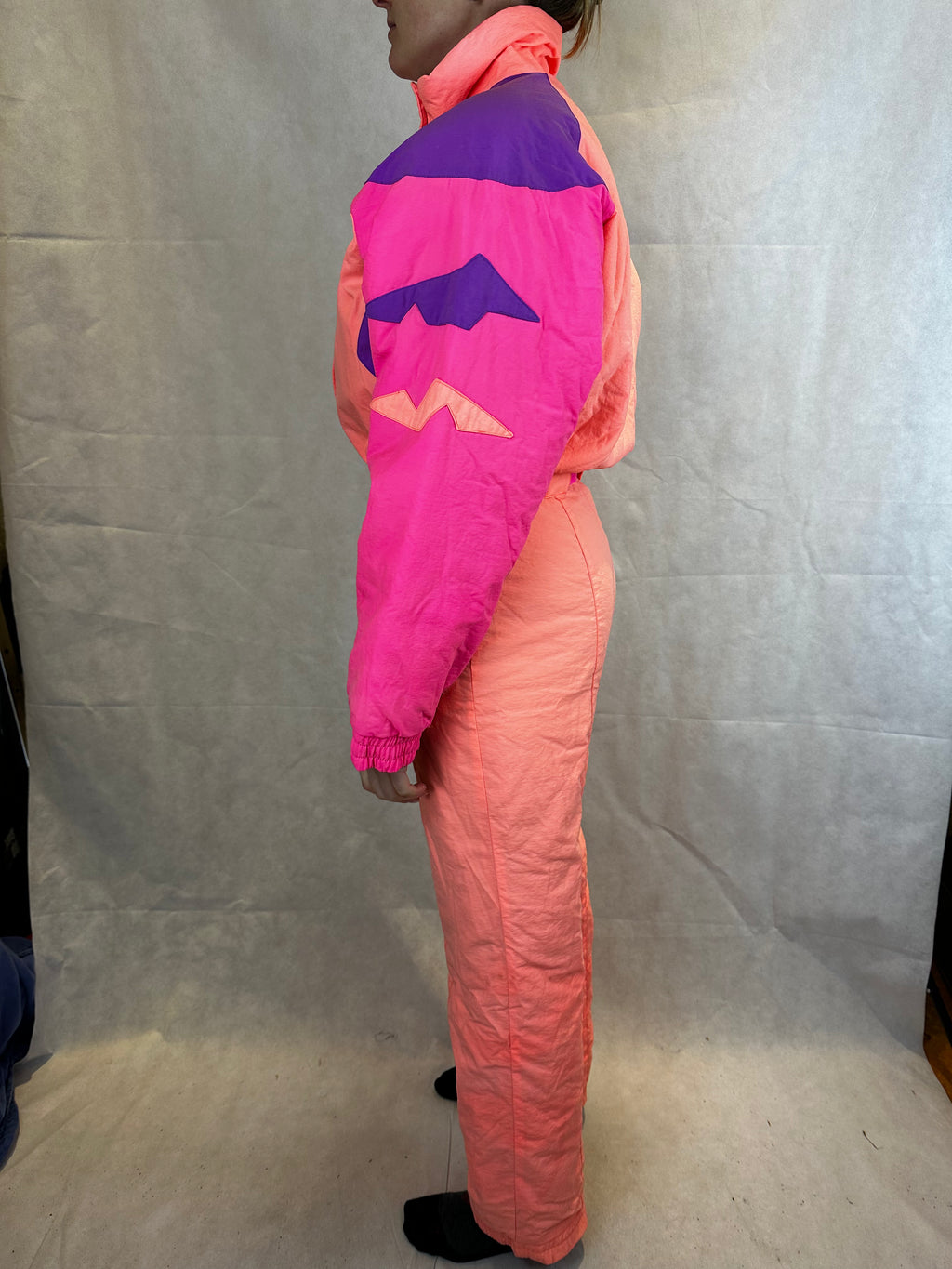Vintage Skioverall von FILA in rosa/orange in S/M