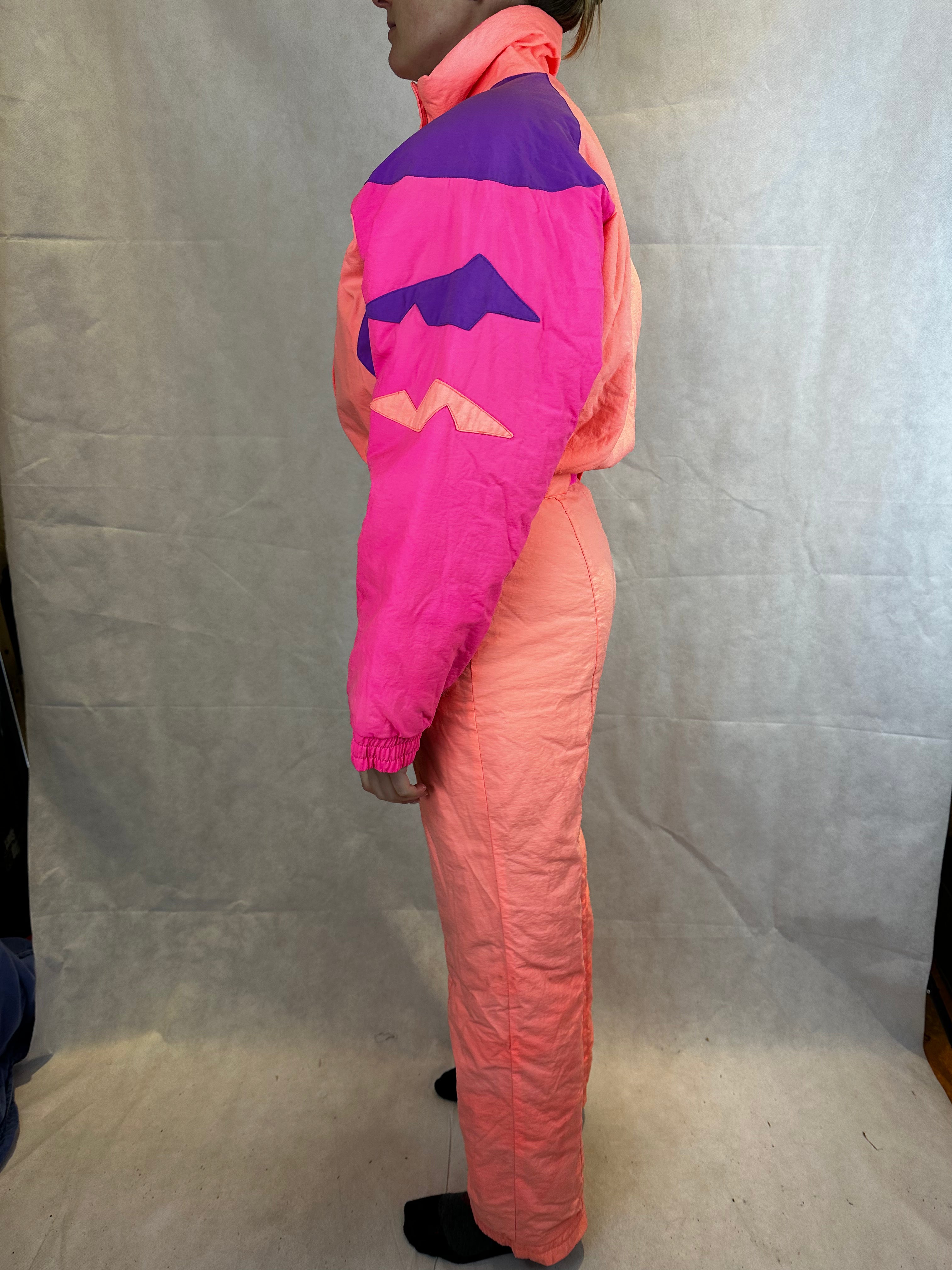 Vintage Skioverall von FILA in rosa/orange in S/M