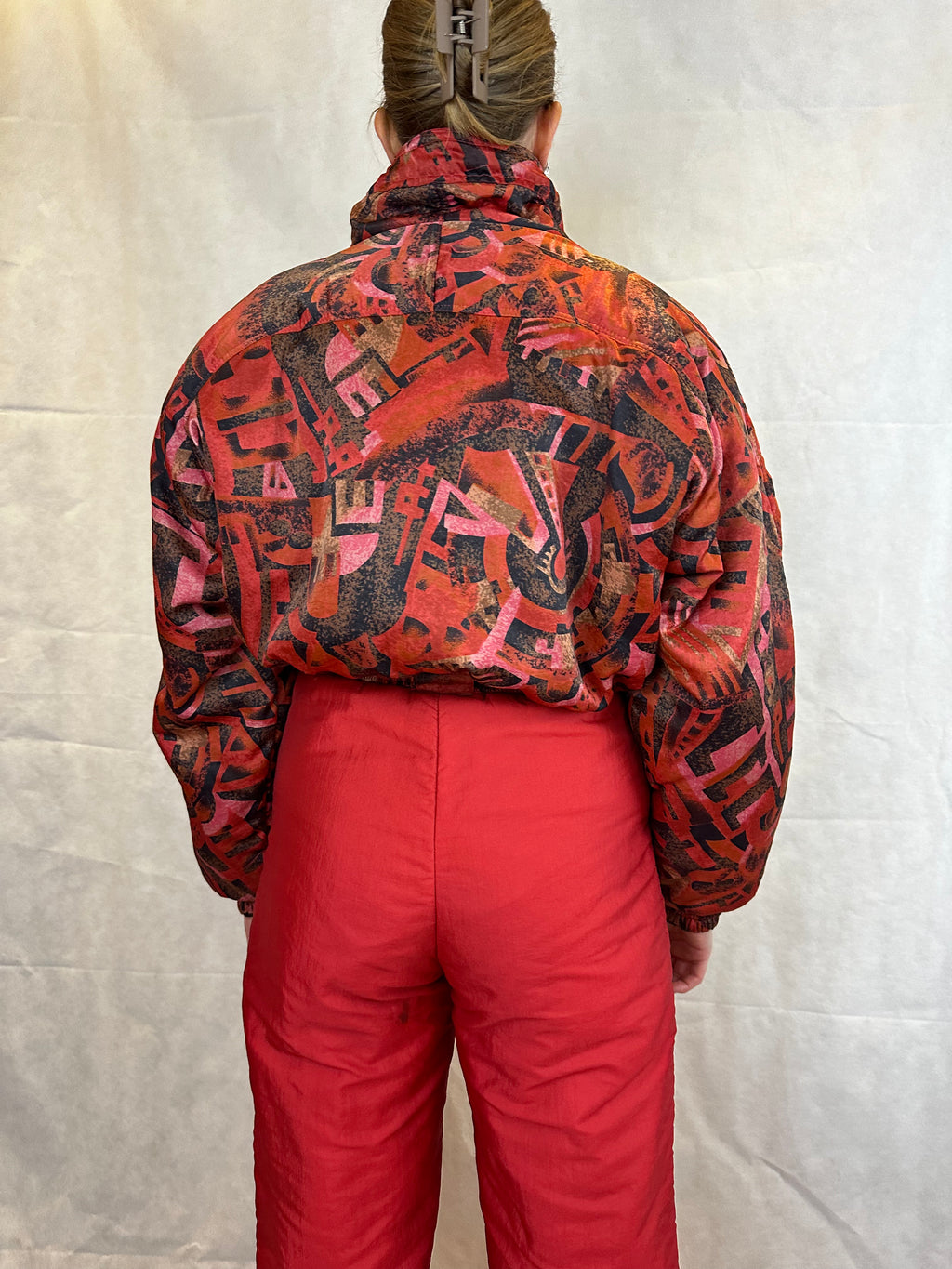 Vintage Skioverall in rot mit muster in M/S