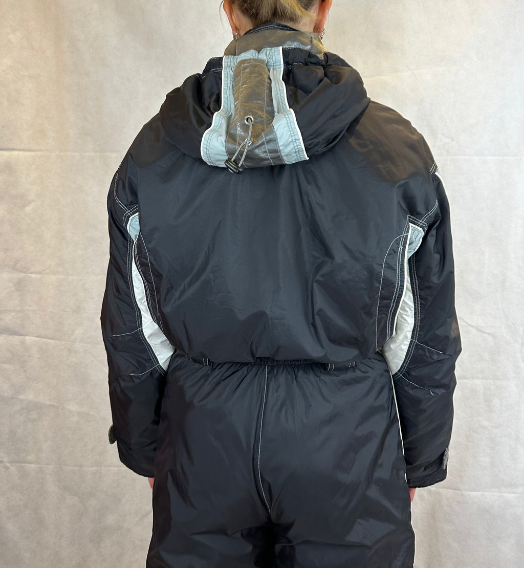 Vintage Skioverall von DIADORA in Schwarz/Silber S/M