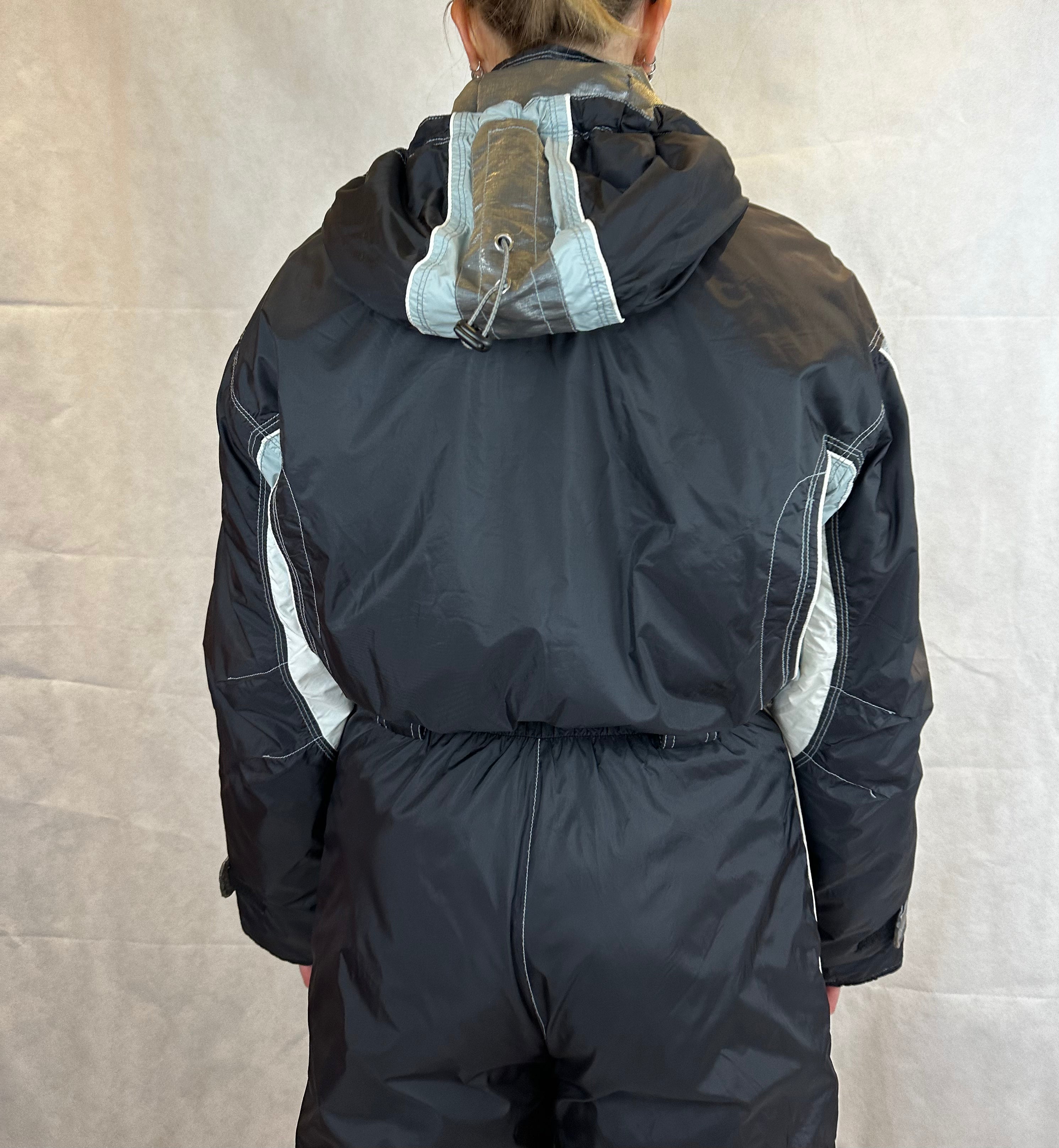 Vintage Skioverall von DIADORA in Schwarz/Silber S/M