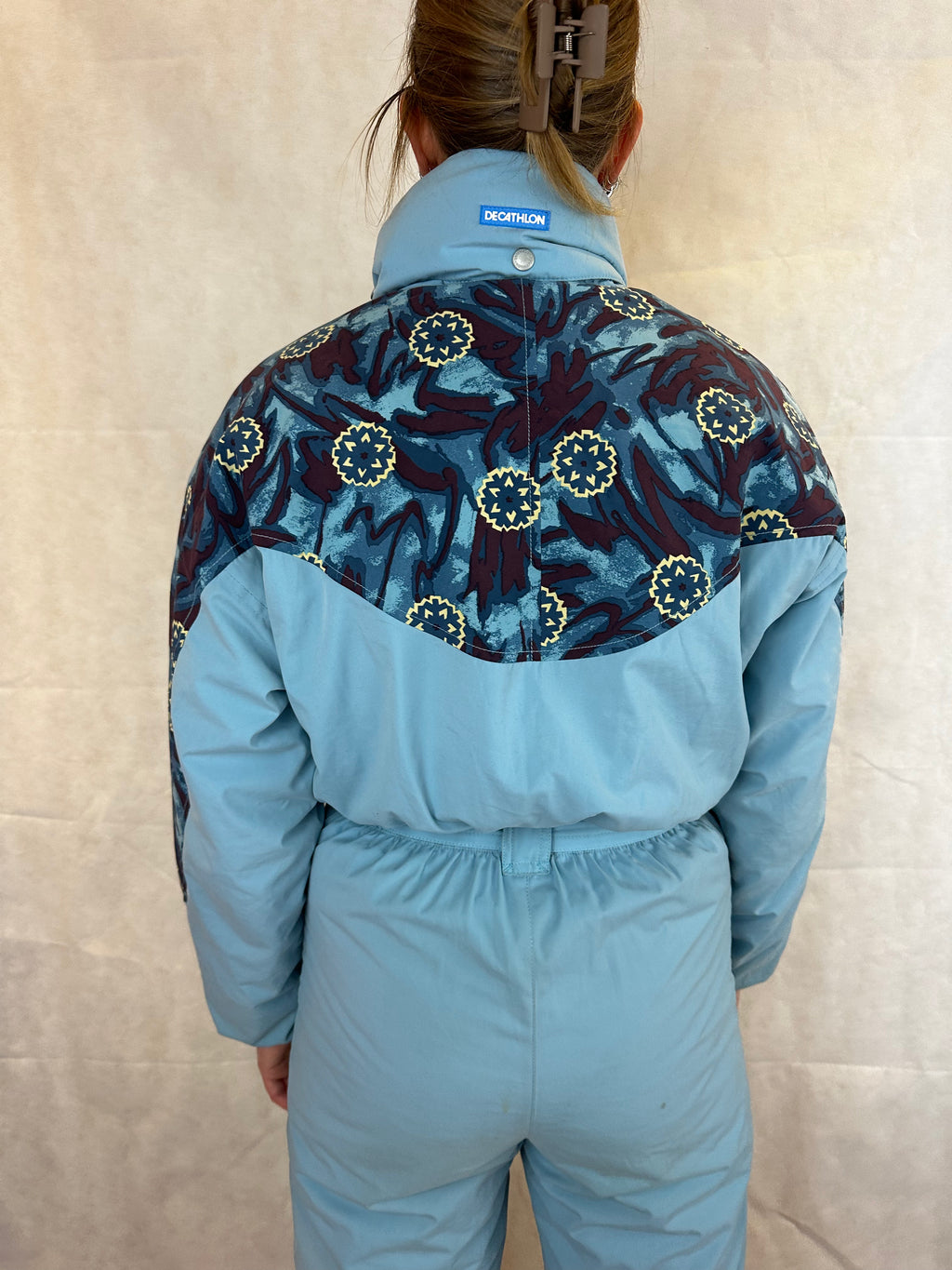 Vintage Skioverall in turkis mit Muster S/M