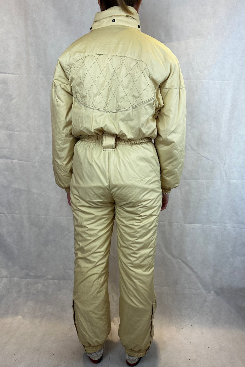 Vintage Skioverall in gelb mit Kaputze in S/M