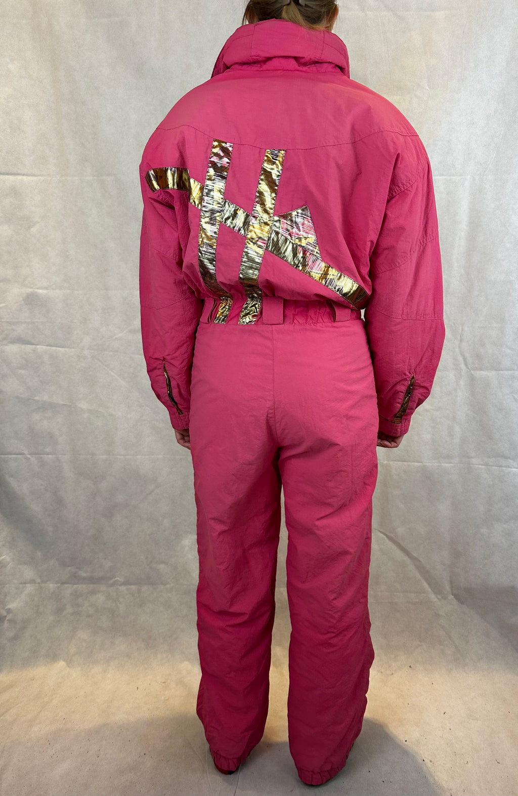 Vintage Skioverall von Sergio tachi in rosa/gold S/M